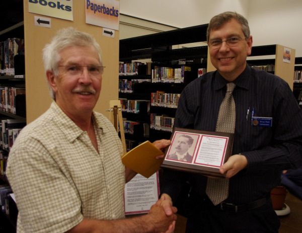 Dr. James Barkley HallInducted June 2011 ~ Dave Whitman accepting the plaque on behalf of Dr. Hall from Commission Chair Brian Reid.